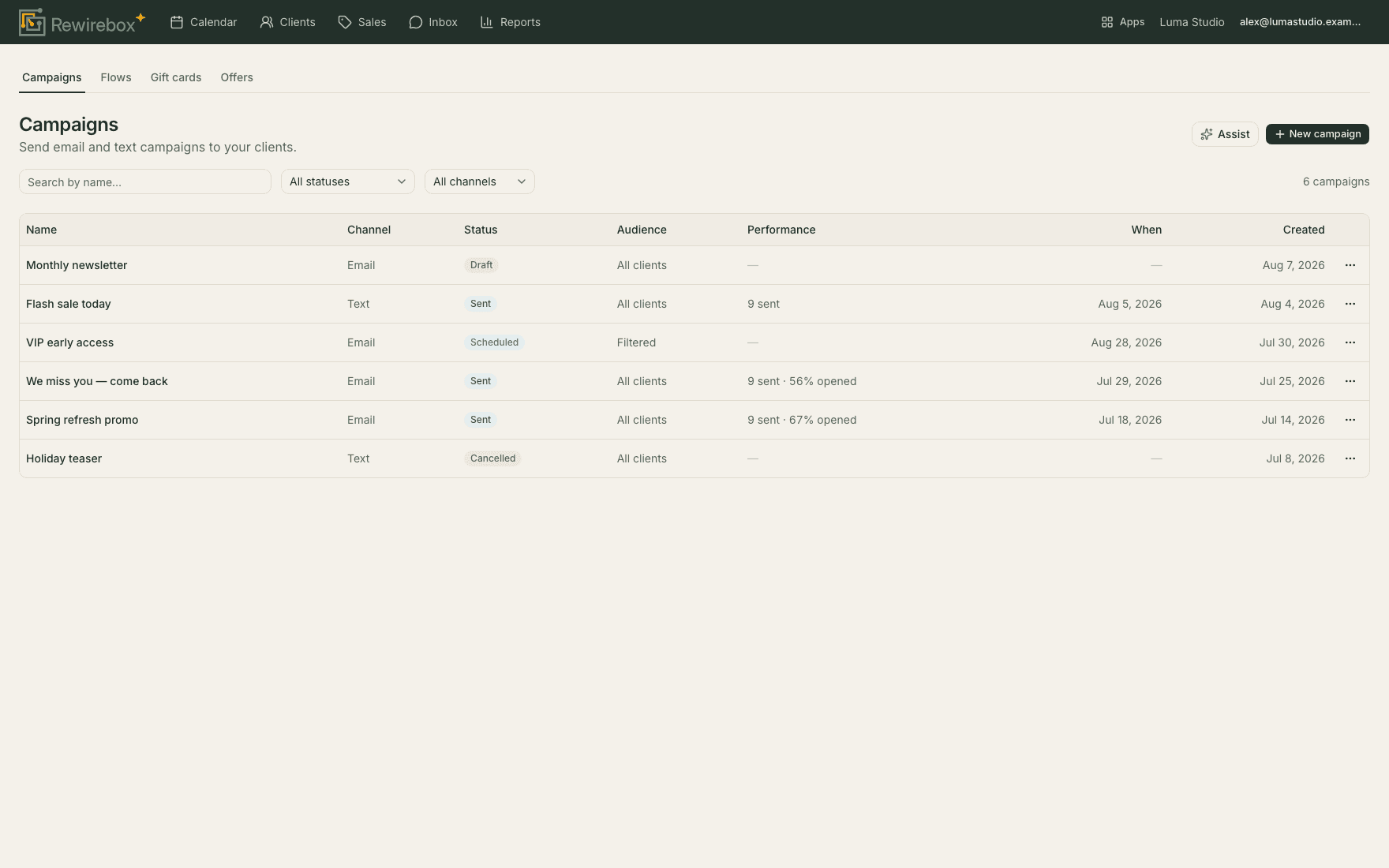 RewireBox marketing — email and text campaigns with their status, audience and open rates.